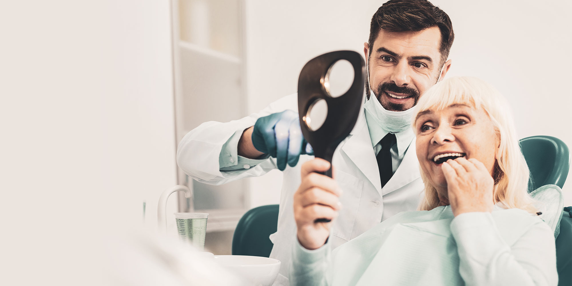dental implant surgery patient smiling after procedure
